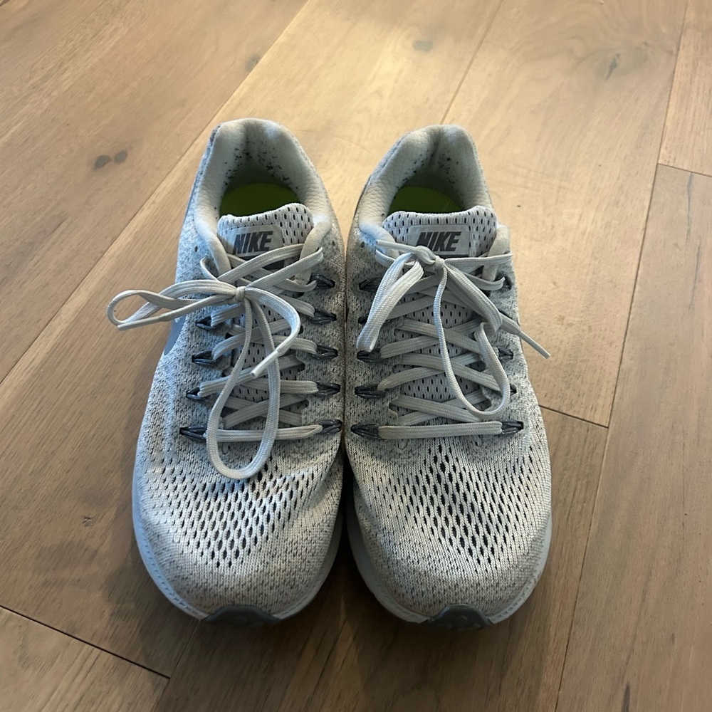 Nike grey and white Flyknit trainers. Rarely worn. New size 9. Got size too big